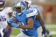 DETROIT, MI - SEPTEMBER 08: Reggie Bush #21 of the Detroit Lions runs for a short gain during the second quarter of the game against the Minnesota Vikings at Ford Field on September 8, 2013 in Detroit, Michigan. (Photo by Leon Halip/Getty Images)