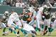Nov 24, 2013; East Rutherford, NJ, USA; Miami Dolphins kicker Caleb Sturgis (9) attempts but misses a field goal against the New York Jets during the game at MetLife Stadium. Mandatory Credit: Robert Deutsch-USA TODAY Sports
