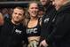Dec 28, 2013; Las Vegas, NV, USA; Ronda Rousey reacts with her corner after defeating Miesha Tate (not pictured) in their UFC women's bantamweight championship bout at the MGM Grand Garden Arena. Mandatory Credit: Jayne Kamin-Oncea-USA TODAY Sports