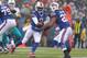 Expect a lot of this when the Bills play in cold, rainy conditions at Gillette Stadium on Sunday afternoon.