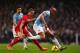 MANCHESTER, ENGLAND - DECEMBER 26: Vincent Kompany of Manchester City is closed down by Jordan Henderson of Liverpool during the Barclays Premier League match between Manchester City and Liverpool at Etihad Stadium on December 26, 2013 in Manchester, England. (Photo by Alex Livesey/Getty Images)