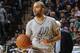 SAN ANTONIO, TX - DECEMBER 25: Tony Parker #9 of the San Antonio Spurs handles the ball during a game against the Houston Rockets on December 25, 2013 at the AT&T Center in San Antonio, Texas. NOTE TO USER: User expressly acknowledges and agrees that, by downloading and/or using this photograph, user is consenting to the terms and conditions of the Getty Images License Agreement. Mandatory Copyright Notice: Copyright 2013 NBAE (Photo by D. Clarke Evans/NBAE via Getty Images)