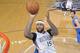 SACRAMENTO, CA - DECEMBER 9: DeMarcus Cousins #15 of the Sacramento Kings shoots against Dirk Nowitzki #41 of the Dallas Mavericks on December 9, 2013 at Sleep Train Arena in Sacramento, California. NOTE TO USER: User expressly acknowledges and agrees that, by downloading and or using this photograph, User is consenting to the terms and conditions of the Getty Images Agreement. Mandatory Copyright Notice: Copyright 2013 NBAE (Photo by Rocky Widner/NBAE via Getty Images)