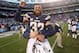 SAN DIEGO, CA - DECEMBER 29: Safety Eric Weddle #32 of the San Diego Chargers celebrates as he is lifted after the game with the Kansas City Chiefs at Qualcomm Stadium on December 29, 2013 in San Diego, California. The Chargers won 27-2 in overtime. (Photo by Stephen Dunn/Getty Images)