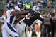 Dec 29, 2013; Oakland, CA, USA; Oakland Raiders quarterback Terrelle Pryor (2) is sacked by Denver Broncos defensive ends Malik Jackson (97) and Robert Ayers (91) at O.co Coliseum. The Broncos won 34-14. Mandatory Credit: Kirby Lee-USA TODAY Sports