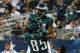 ARLINGTON, TX - DECEMBER 29: Bryce Brown #34 celebrates his touchdown with James Casey #85 of the Philadelphia Eagles in the fourth quarter against the Dallas Cowboys at Cowboys Stadium on December 29, 2013 in Arlington, Texas. (Photo by Ronald Martinez/Getty Images)