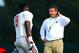 Aug 19, 2013; Columbus, OH, USA; Ohio State Buckeyes head coach Urban Meyer talks with Noah Spence (8) during practice at Ackerman Road Field. Mandatory Credit: Andrew Weber-USA TODAY Sports