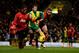NORWICH, ENGLAND - DECEMBER 28: Patrice Evra and Nemanja Vidic Manchester United battle with Wes Hoolahan of Norwich City during the Barclays Premier League match between Norwich City and Manchester United at Carrow Road on December 28, 2013 in Norwich, England. (Photo by Michael Regan/Getty Images)
