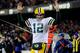 CHICAGO, IL - DECEMBER 29: Quarterback Aaron Rodgers #12 of the Green Bay Packers celebrates a touchdown against the Chicago Bears in the second quarter during a game at Soldier Field on December 29, 2013 in Chicago, Illinois. (Photo by David Banks/Getty Images)