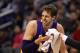 PHOENIX, AZ - DECEMBER 23: Pau Gasol #16 of the Los Angeles Lakers reacts after being cut near his right eye during the second half of the NBA game against the Phoenix Suns at US Airways Center on December 23, 2013 in Phoenix, Arizona. The Suns defeated the Lakers 117-90. NOTE TO USER: User expressly acknowledges and agrees that, by downloading and or using this photograph, User is consenting to the terms and conditions of the Getty Images License Agreement. (Photo by Christian Petersen/Getty Images)