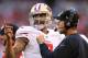 GLENDALE, AZ - DECEMBER 29: (L-R) Colin Kaepernick
