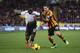 HULL, ENGLAND - DECEMBER 01: Victor Moses of Liverpool is tackled by Robert Koren of Hull City during the Barclays Premier League match between Hull City and Liverpool at KC Stadium on December 1, 2013 in Hull, England. (Photo by Jamie McDonald/Getty Images)