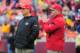 Jan 22, 2012; San Francisco, CA, USA; San Francisco 49ers defensive coordinator Vic Fangio (left) and offensive coordinator Greg Roman (right) watch warm ups before the 2011 NFC Championship game against the New York Giants at Candlestick Park. Mandatory Credit: Kyle Terada-USA TODAY Sports