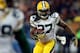 CHICAGO, IL - DECEMBER 29: Running back Eddie Lacy #27 of the Green Bay Packers carries the ball against the Chicago Bears during a game at Soldier Field on December 29, 2013 in Chicago, Illinois. (Photo by Jonathan Daniel/Getty Images)