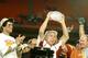 USC Head Coach Pete Carroll holds up the National Championship Trophy during the FedEx Orange Bowl National Championship at Pro Player Stadium in Miami, Florida on January 4, 2005. USC beat Oklahoma 55-19. (Photo by A. Messerschmidt/Getty Images)