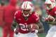 Nov 16, 2013; Madison, WI, USA; Wisconsin Badgers running back Melvin Gordon (25) carries the footbal during warmups prior to the game against the Indiana Hoosiers at Camp Randall Stadium. Mandatory Credit: Jeff Hanisch-USA TODAY Sports
