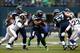SEATTLE - DECEMBER 29: Marshawn Lynch #24 runs the ball against the Seattle Seahawks of the St. Louis Rams on December 29, 2013 at CenturyLink Field in Seattle, Washington. (Photo by Jonathan Ferrey/Getty Images)