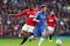 MANCHESTER, ENGLAND - MARCH 10: Juan Mata of Chelsea competes with Patrice Evra of Manchester United during the FA Cup sponsored by Budweiser Sixth Round match between Manchester United and Chelsea at Old Trafford on March 10, 2013 in Manchester, England. (Photo by Alex Livesey/Getty Images)