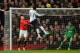 MANCHESTER, ENGLAND - JANUARY 01: Emmanuel Adebayor of Tottenham Hotspur scores the opening goal during the Barclays Premier League match between Manchester United and Tottenham Hotspur at Old Trafford on January 1, 2014 in Manchester, England. (Photo by Michael Regan/Getty Images)