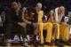 Dec 31, 2013; Los Angeles, CA, USA; Los Angeles Lakers players (from left) Kobe Bryant and Jordan Hill and Chris Kaman and Robert Sacre react in the fourth quarter against the Milwaukee Bucks at Staples Center. The Bucks defeated the Lakers 94-79. Mandatory Credit: Kirby Lee-USA TODAY Sports