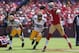 SAN FRANCISCO, CA - SEPTEMBER 08: Quarterback Colin Kaepernick #7 of the San Francisco 49ers is pursued by Micah Hyde #33 and Mike Neal #96 of the Green Bay Packers at Candlestick Park on September 8, 2013 in San Francisco, California. (Photo by Jeff Gross/Getty Images)