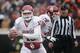 STILLWATER, OK - DECEMBER 7: Quarterback Blake Bell #10 of the Oklahoma Sooners looks outside during the game against the Oklahoma State Cowboys December 7, 2013 at Boone Pickens Stadium in Stillwater, Oklahoma. Oklahoma defeated Oklahoma State 33-24. (Photo by Brett Deering/Getty Images)