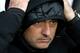 SOUTHAMPTON, ENGLAND - JANUARY 01: Jose Mourinho the Chelsea manager braves the elements during the Barclays Premier League match between Southampton and Chelsea at St Mary's Stadium on January 1, 2014 in Southampton, England. (Photo by Warren Little/Getty Images)