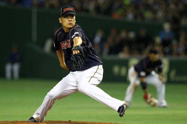 Hi-res-163368525-pitcher-masahiro-tanaka-of-japan-pitches-during-the_crop_north