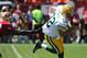 Sep 8, 2013; San Francisco, CA, USA; San Francisco 49ers linebacker Aldon Smith (99) grabs the jersey of Green Bay Packers quarterback Aaron Rodgers (12) forcing a fumble, recovered by Rodgers during the first quarter at Candlestick Park. Mandatory Credit: Kelley L Cox-USA TODAY Sports