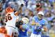 Dec 1, 2013; San Diego, CA, USA; San Diego Chargers quarterback Philip Rivers (17) throws over the reach of Cincinnati Bengals defensive end Carlos Dunlap (96) during the second half at Qualcomm Stadium. The Bengals won 17-10. Mandatory Credit: Christopher Hanewinckel-USA TODAY Sports