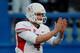 SAN JOSE, CA - NOVEMBER 29: Quarterback Derek Carr #4 of the Fresno State Bulldogs shows how close the offense is to a touchdown against the San Jose State Spartans in the fourth quarter on November 29, 2013 at Spartan Stadium in San Jose, California. The Spartans upset the Bulldogs 62-52. (Photo by Brian Bahr/Getty Images)