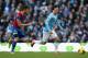 MANCHESTER, ENGLAND - DECEMBER 28: Joel Ward of Crystal Palace challenges David Silva of Manchester City during the Barclays Premier League match between Manchester City and Crystal Palace at the Etihad Stadium on December 28, 2013 in Manchester, England. (Photo by Jan Kruger/Getty Images)