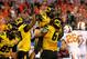 ARLINGTON, TX - JANUARY 03: Henry Josey #20 of the Missouri Tigers celebrates scoring a 25-yard touchdown with Max Copeland #61 in the fourth quarter against the Oklahoma State Cowboys during the AT&T Cotton Bowl on January 3, 2014 in Arlington, Texas. (Photo by Ronald Martinez/Getty Images)