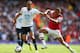 LONDON, ENGLAND - SEPTEMBER 01: Andros Townsend of Tottenham Hotspur is challenged by Kieran Gibbs of Arsenal during the Barclays Premier League match between Arsenal and Tottenham Hotspur at Emirates Stadium on September 01, 2013 in London, England. (Photo by Clive Mason/Getty Images)