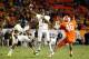 MIAMI GARDENS, FL - JANUARY 04: Geno Smith #12 of the West Virginia Mountaineers throws a pass against the Clemson Tigers during the Discover Orange Bowl at Sun Life Stadium on January 4, 2012 in Miami Gardens, Florida. (Photo by J. Meric/Getty Images)