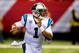 Dec 29, 2013; Atlanta, GA, USA; Carolina Panthers quarterback Cam Newton (1) runs with the ball against the Atlanta Falcons during the second half at the Georgia Dome. The Panthers defeated the Falcons 21-20. Mandatory Credit: Dale Zanine-USA TODAY Sports