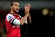 LONDON, ENGLAND - JANUARY 01: Theo Walcott of Arsenal applauds the crowd after the Barclays Premier League match between Arsenal and Cardiff City at Emirates Stadium on January 1, 2014 in London, England. (Photo by Shaun Botterill/Getty Images)