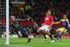 MANCHESTER, ENGLAND - JANUARY 05: Javier Hernandez of Manchester United scores his team's first goal during the FA Cup with Budweiser Third round match between Manchester United and Swansea City at Old Trafford on January 5, 2014 in Manchester, England. (Photo by Alex Livesey/Getty Images)