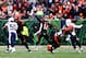 CINCINNATI, OH - JANUARY 05: Quarterback Andy Dalton #14 of the Cincinnati Bengals passes against the San Diego Chargers during a Wild Card Playoff game at Paul Brown Stadium on January 5, 2014 in Cincinnati, Ohio. (Photo by Andy Lyons/Getty Images)