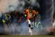 DENVER, CO - DECEMBER 12: Quarterback Peyton Manning #18 of the Denver Broncos emerges from the tunnel during player introductions before a game against the San Diego Chargers at Sports Authority Field Field at Mile High on December 12, 2013 in Denver, Colorado. (Photo by Dustin Bradford/Getty Images)