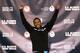 SALT LAKE CITY, UT - DECEMBER 31: Shani Davis celebrates on the medals podium after winning the men's 1,500 meter during the U.S. Speed Skating Long Track Olympic Trials at the Utah Olympic Oval on December 31, 2013 in Salt Lake City, Utah. (Photo by Matthew Stockman/Getty Images)