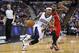 Dec 15, 2013; Sacramento, CA, USA; Sacramento Kings point guard Isaiah Thomas (22) drives in against Houston Rockets point guard Aaron Brooks (0) during the third quarter at Sleep Train Arena. The Sacramento Kings defeated the Houston Rockets 106-91. Mandatory Credit: Kelley L Cox-USA TODAY Sports
