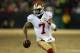 GREEN BAY, WI - JANUARY 05: Colin Kaepernick #7 of the San Francisco 49ers runs the ball for a first down in the fourth quarter against the Green Bay Packers during their NFC Wild Card Playoff game at Lambeau Field on January 5, 2014 in Green Bay, Wisconsin. (Photo by Jonathan Daniel/Getty Images)