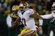 GREEN BAY, WI - JANUARY 05: Colin Kaepernick #7 of the San Francisco 49ers runs the ball against the Green Bay Packers during their NFC Wild Card Playoff game at Lambeau Field on January 5, 2014 in Green Bay, Wisconsin. (Photo by Jonathan Daniel/Getty Images)