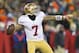 Jan 5, 2014; Green Bay, WI, USA; San Francisco 49ers quarterback Colin Kaepernick (7) throws a pass during the fourth quarter against the Green Bay Packers during the 2013 NFC wild card playoff football game at Lambeau Field. San Francisco won 23-20. Mandatory Credit: Jeff Hanisch-USA TODAY Sports
