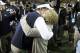 Dec 7, 2013; Atlanta, GA, USA; Auburn Tigers head coach Gus Malzahn hugs his wife Kristi Malzahn after winning the 2013 SEC Championship game against the Missouri Tigers at Georgia Dome. Auburn won 59-42. Mandatory Credit: Brett Davis-USA TODAY Sports