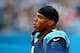 CHARLOTTE, NC - DECEMBER 22: Cam Newton #1 of the Carolina Panthers watches on during their game against the New Orleans Saints at Bank of America Stadium on December 22, 2013 in Charlotte, North Carolina. (Photo by Streeter Lecka/Getty Images)