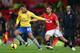 MANCHESTER, ENGLAND - NOVEMBER 10: Ryan Giggs of Manchester United competes with Serge Gnabry of Arsenal during the Barclays Premier League match between Manchester United and Arsenal at Old Trafford on November 10, 2013 in Manchester, England. (Photo by Alex Livesey/Getty Images)