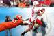 JACKSONVILLE, FL - JANUARY 1: Quarterback Joe Ganz #12 of the Nebraska Cornhuskers alludes the tackle of Da'Quan Bowers #93 of the Clemson Tigers during the Konica Minolta Gator Bowl at Jacksonville Municipal Stadium January 1, 2009 in Jacksonville, Florida. (Photo by Sam Greenwood/Getty Images)