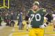 Jan 5, 2014; Green Bay, WI, USA; Green Bay Packers guard T.J. Lang (70) walks off the field after the San Francisco 49ers beat the Packers 23-20 during the 2013 NFC wild card playoff football game at Lambeau Field. Mandatory Credit: Benny Sieu-USA TODAY Sports